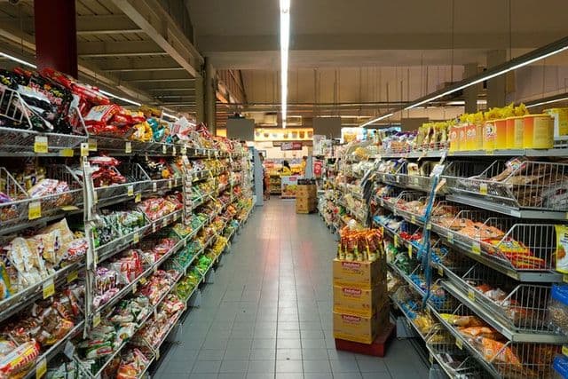 Well-stocked grocery store aisle